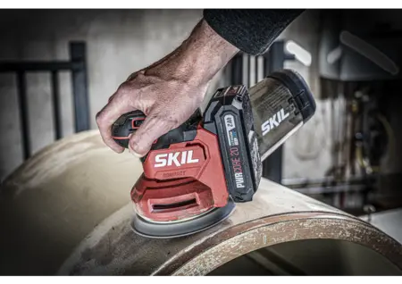 מלטשת אקצנטרית "5 (125 מ"מ) נטענת 20V Brushless XP עם וויסות מהירות אלקטרוני + מיכל איסוף - גוף בלבד SKIL